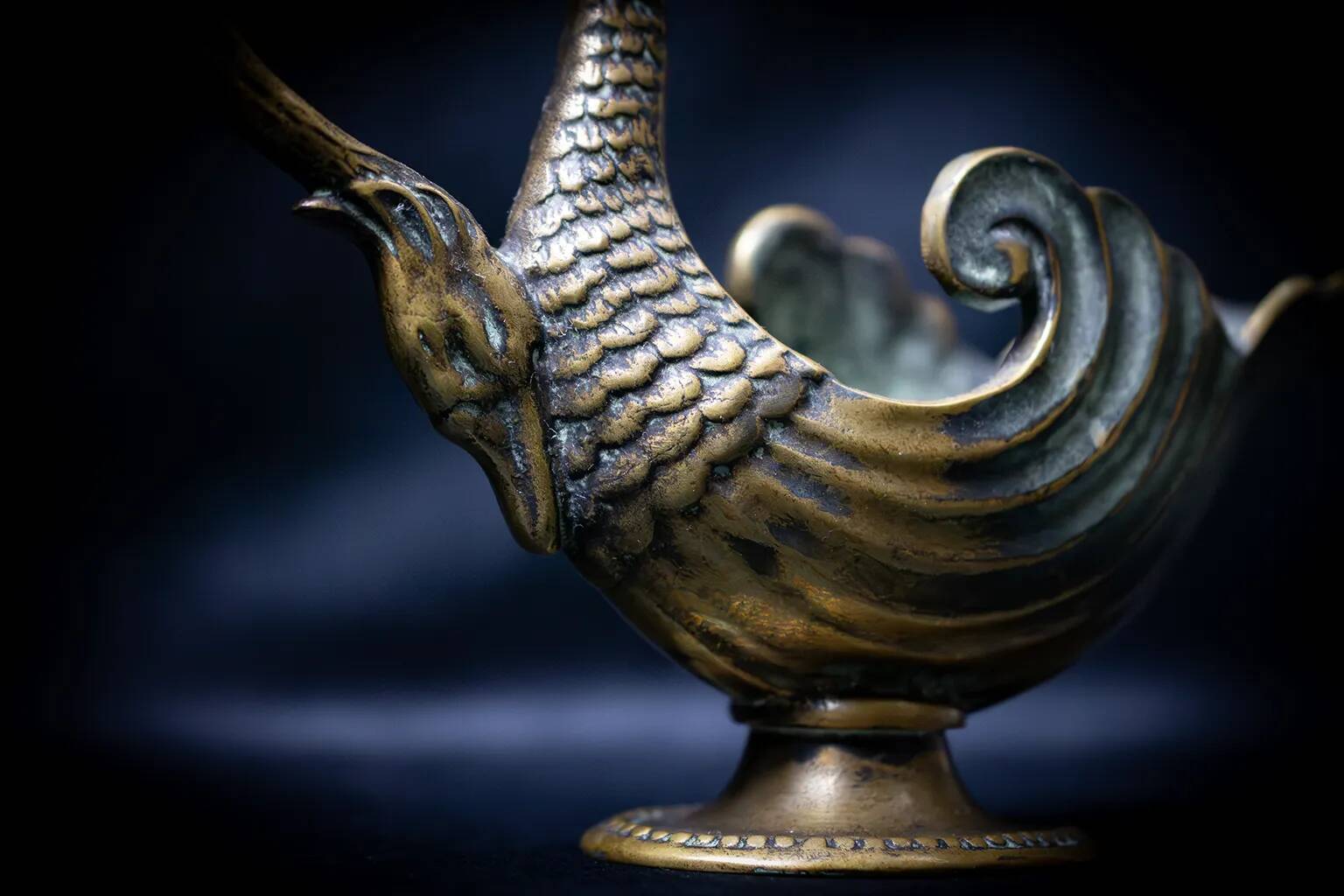Bronze patinated pocket emptier with swan decoration by Max Le Verrier.