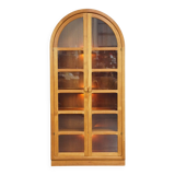 Elegant vintage Danish display cabinet with glass panels and atmospheric lighting