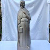 Art Deco statue representing an allegory of knowledge (reading and writing)