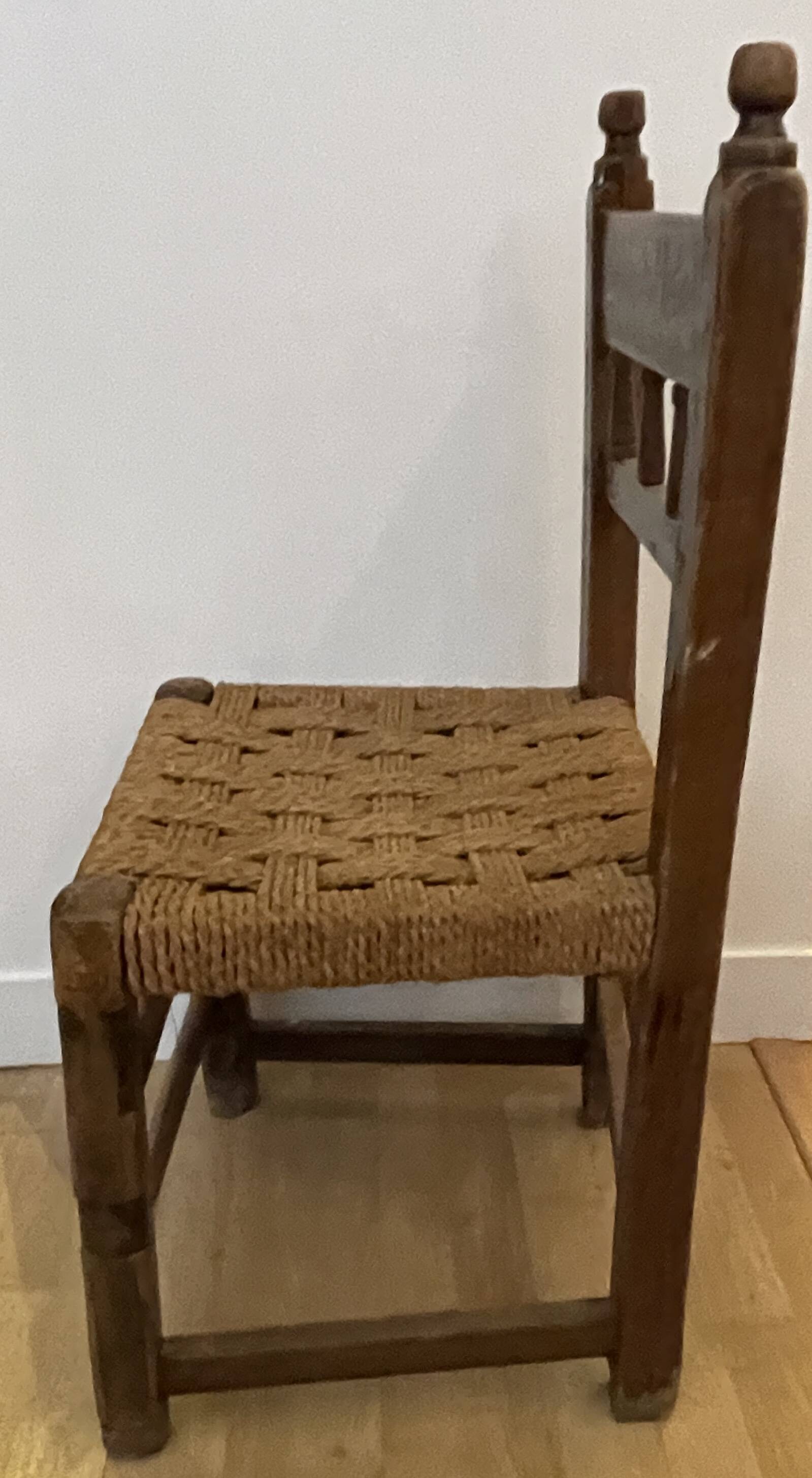Wood chair and rush cord brutalist style from Queyras