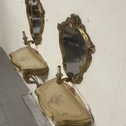 Pair of wall-mounted consoles with a mirror in Louis XV style.