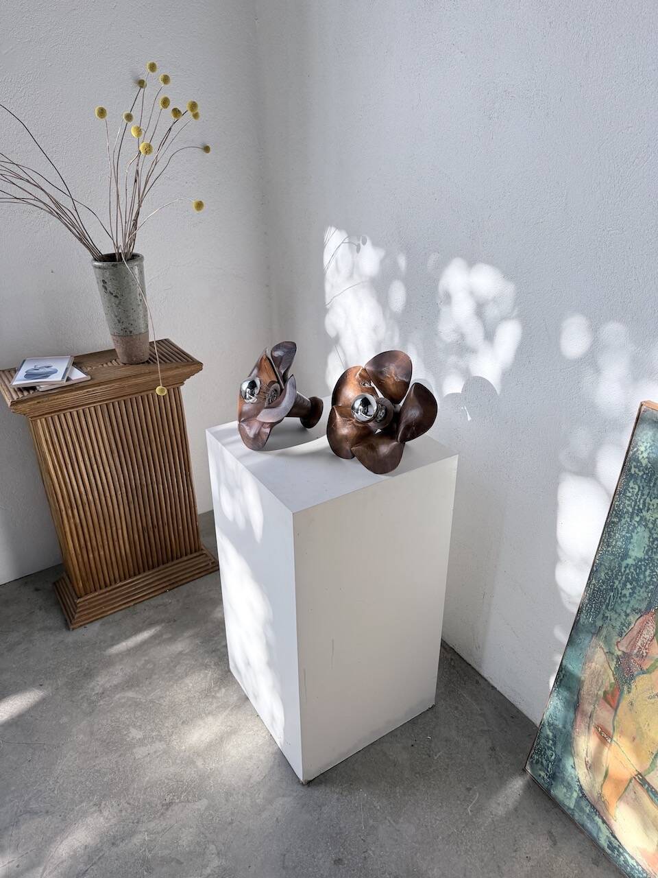 Four wooden flower wall lights from the 1970s.