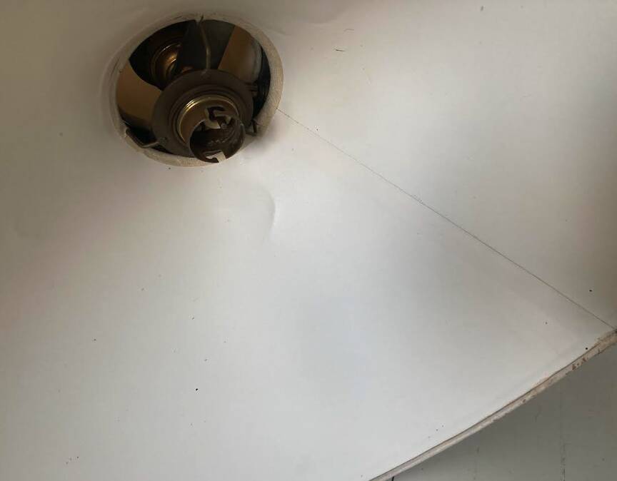 Rare pendulum wall lamp, Editions Maison Lunel, Paris, France, circa 1950