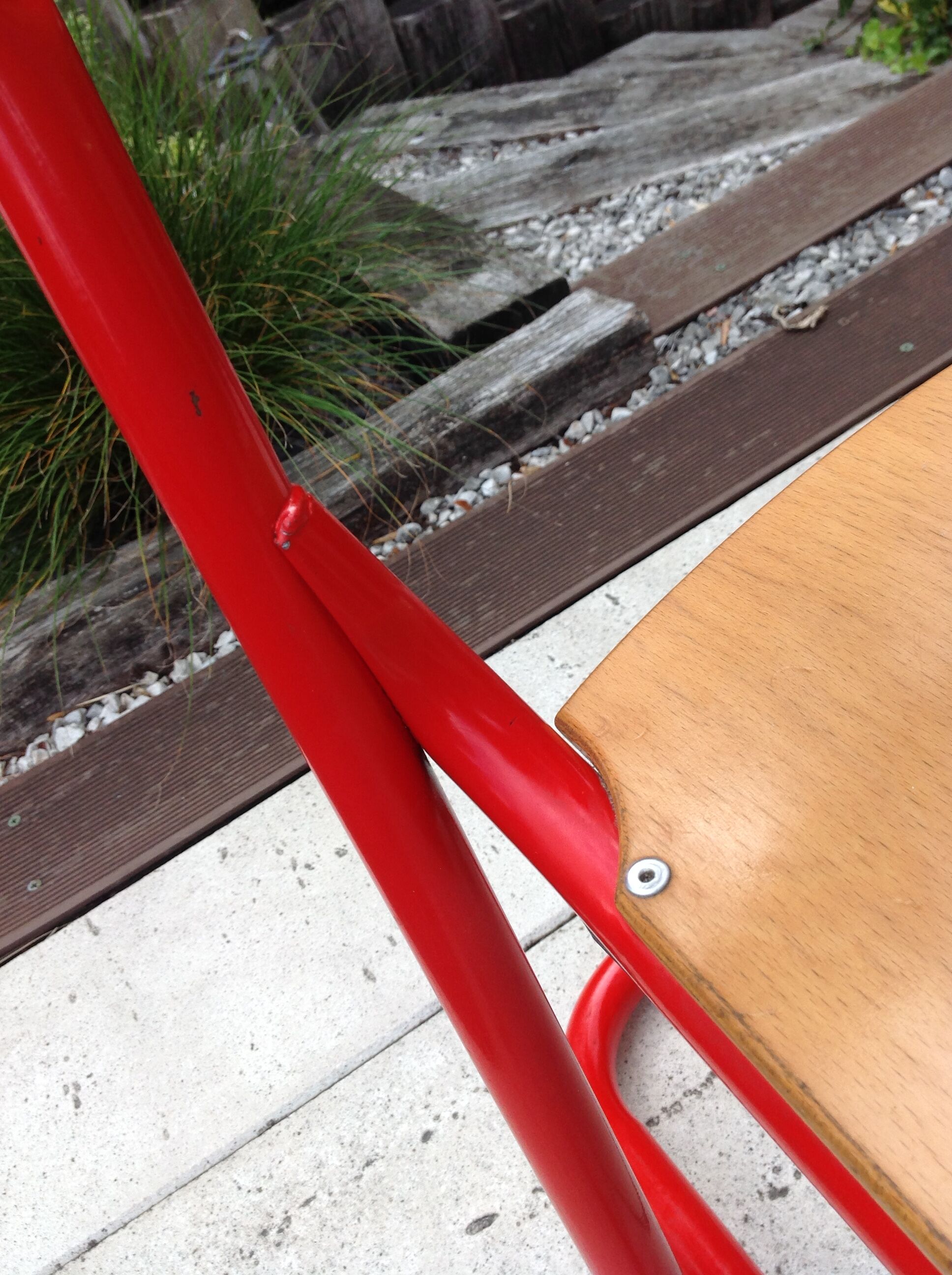 Children's wooden and red metal chair 1970