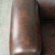 Set of a smooth chesterfield sofa and armchair with a timeless English look