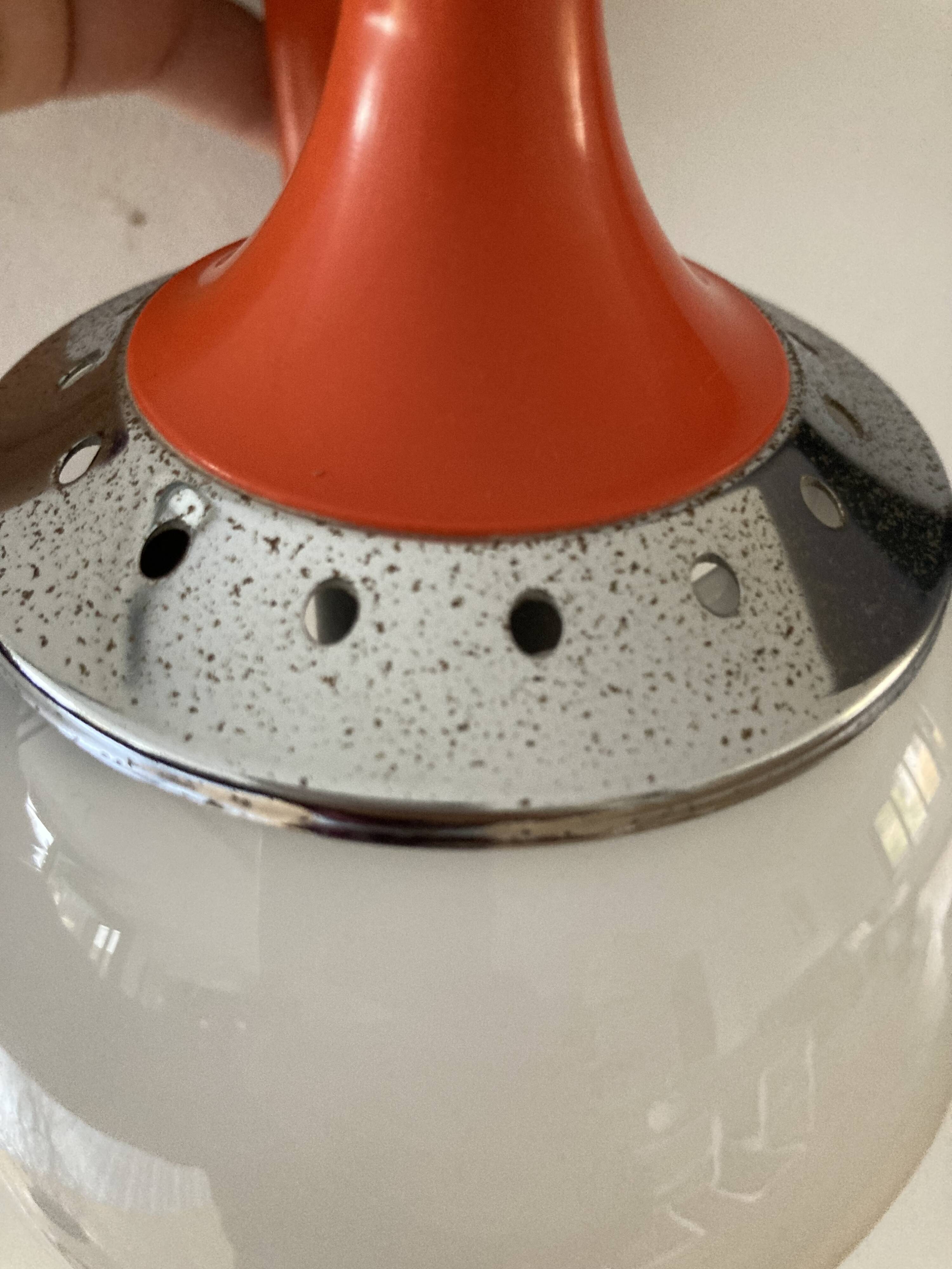 Set of two vintage orange wall lights from the 70s