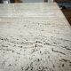 Table basse vintage en travertin – design 70’s