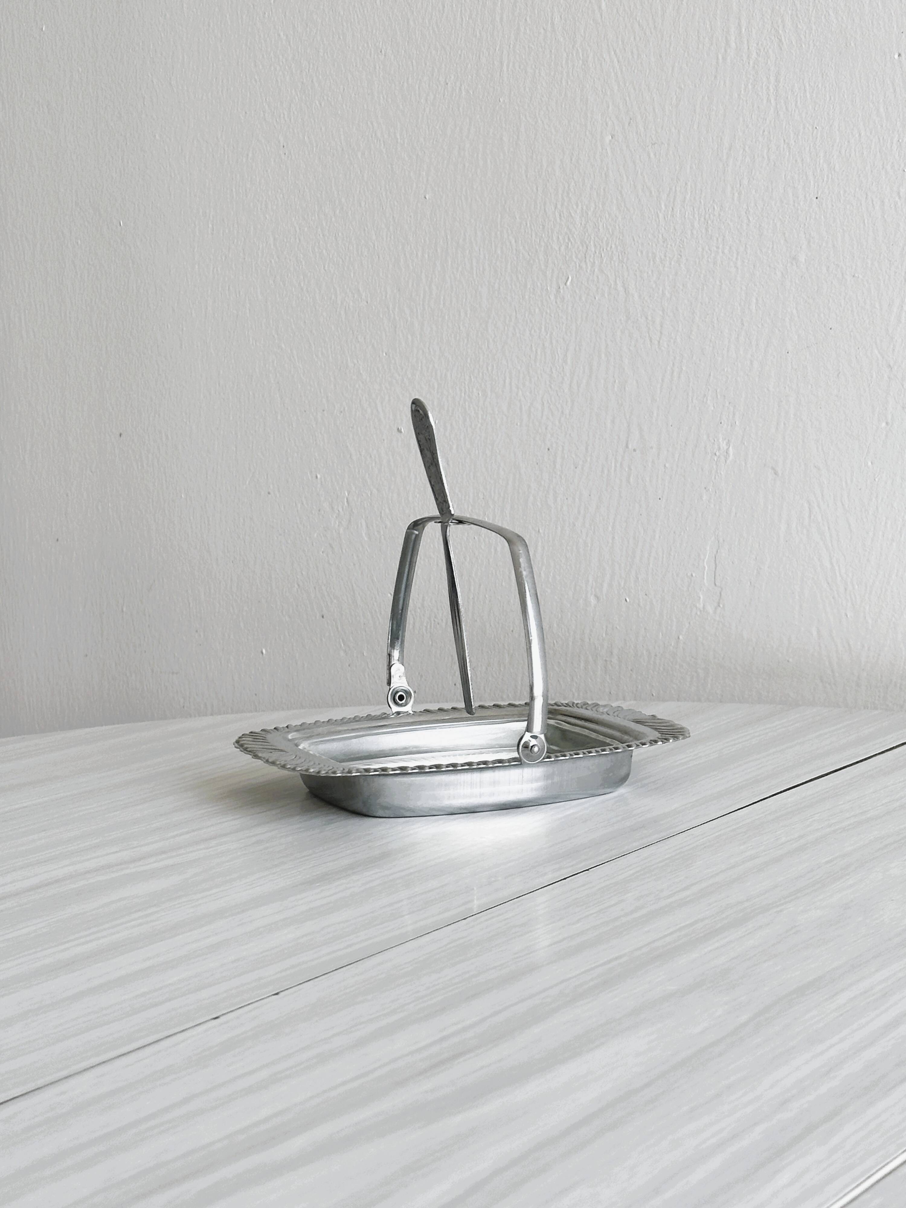 Antique butter or jam dish in silver-plated metal and chiseled glass