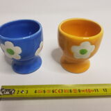 Pair of blue and yellow cockroaches with floral motifs