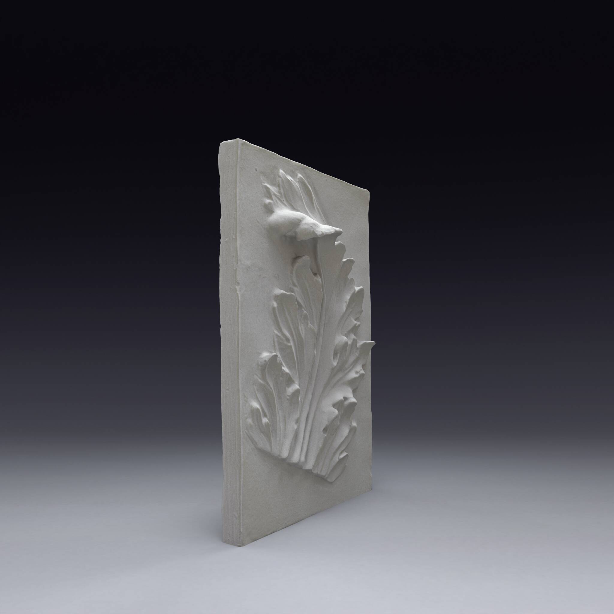 Plaster bas-relief depicting an acanthus leaf, inspired by Roman art.