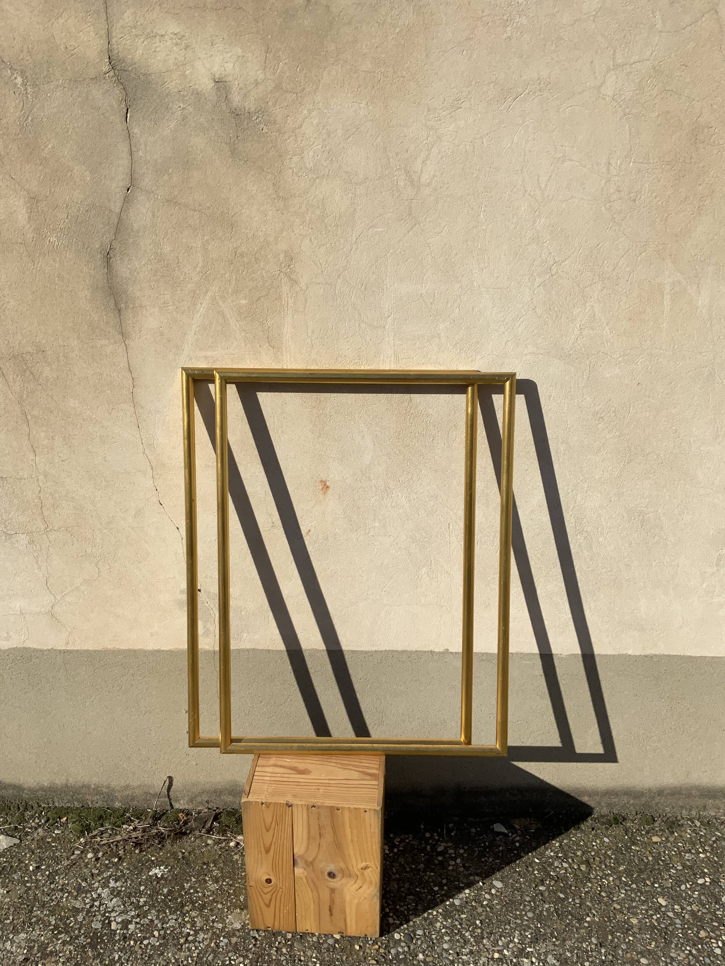 Old frame in gilded wood patina gold leaf