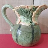 Green pitcher with zucchini patterns