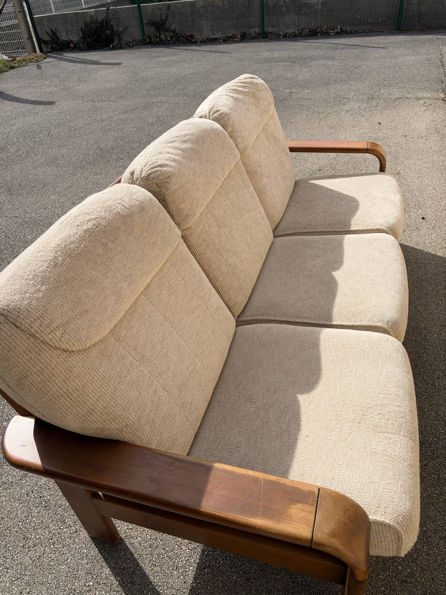Three-seater sofa in Danish teak from the 1960s.