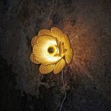 Flower wall light made of rattan petals and nude embroidery