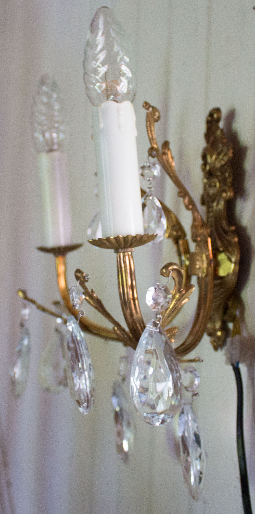 Old brass sconce with glass drops