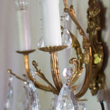 Old brass sconce with glass drops