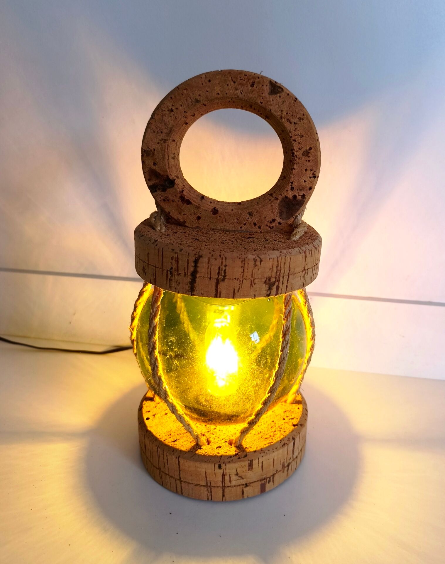 Vintage floating marine lamp made of cork and glass.