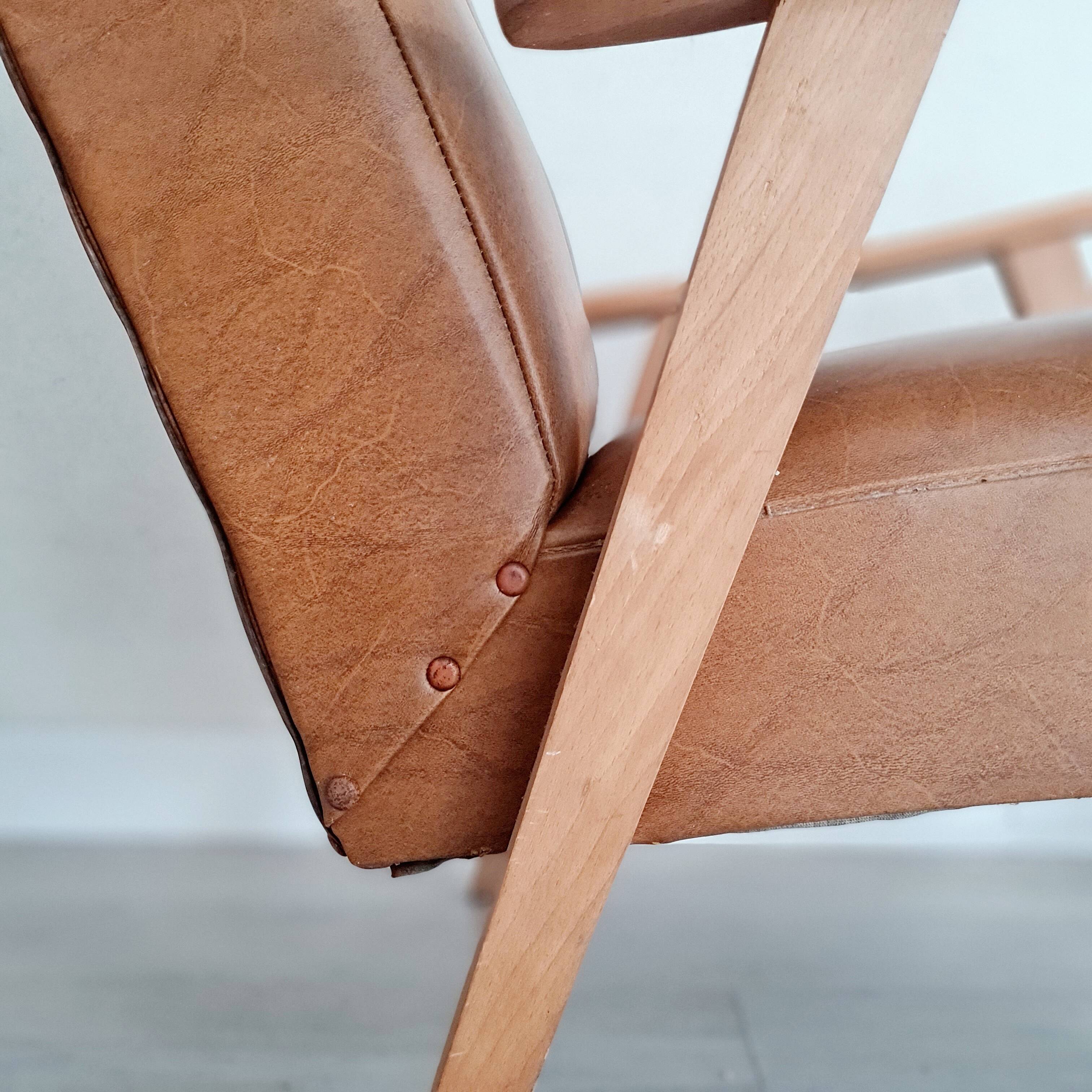 Scandinavian armchair with camel compass legs