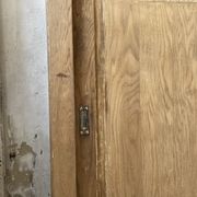 Large row of solid oak loom sliding doors