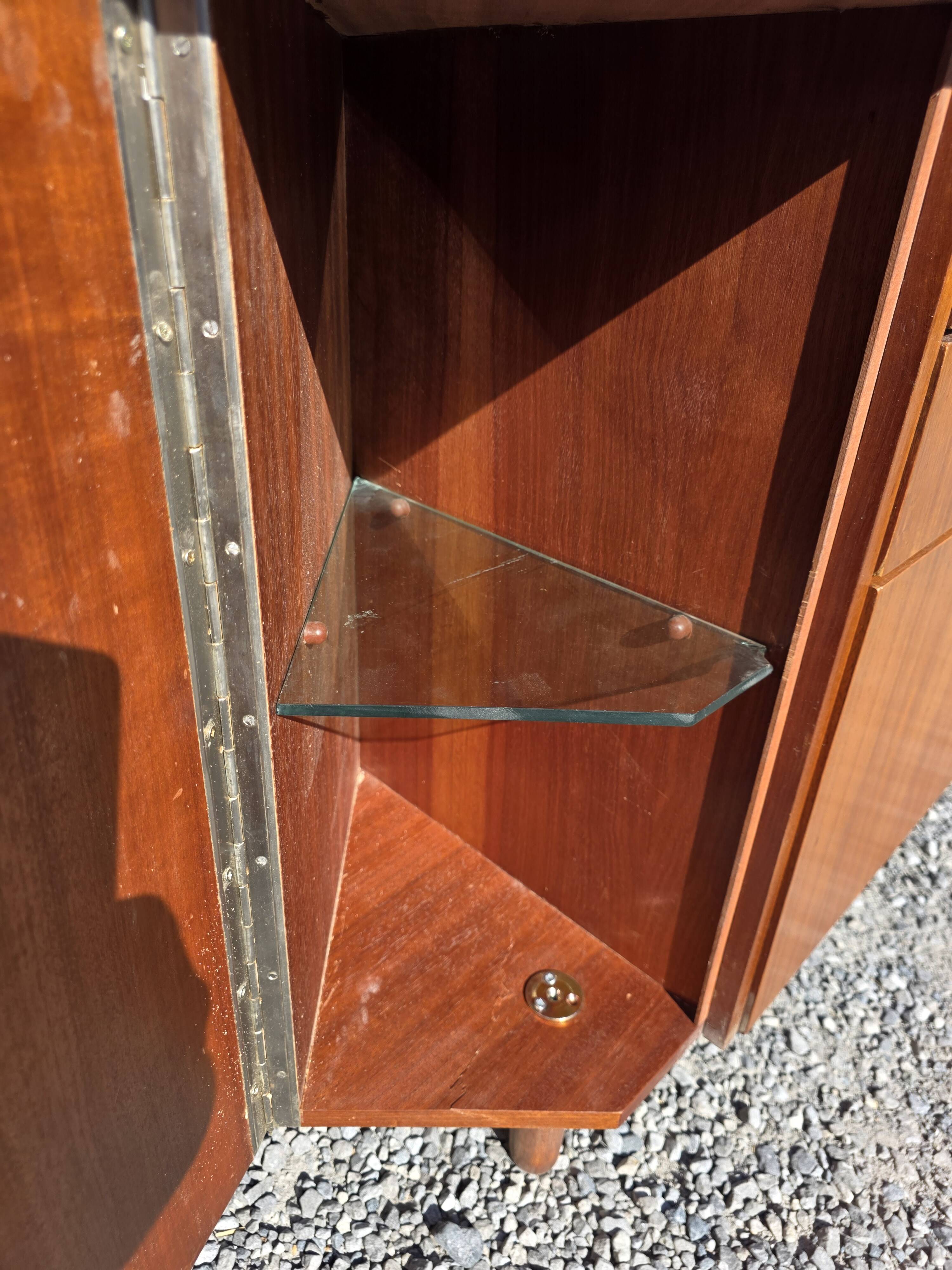 Scandinavian corner unit in teak from the 1960s.