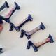 Set of 8 vintage ceramic knife rests, retro dog design.