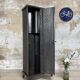 Strafor double-door corrugated iron cloakroom, circa 1920.