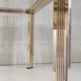 Side table in gold metal and glass - 70s/80s