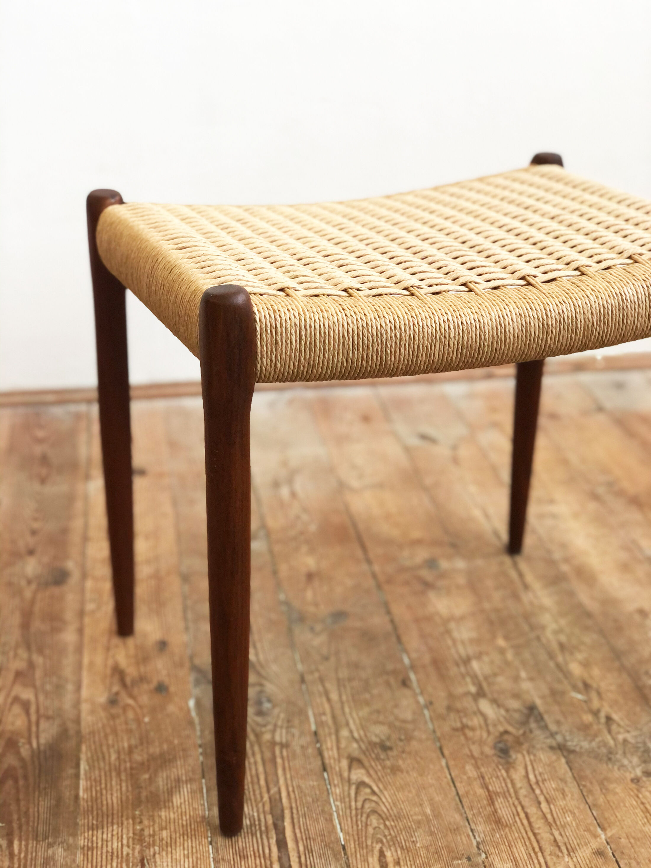 Danish midcentury walnut stool, model 80A by Niels O. Møller with papercord seat