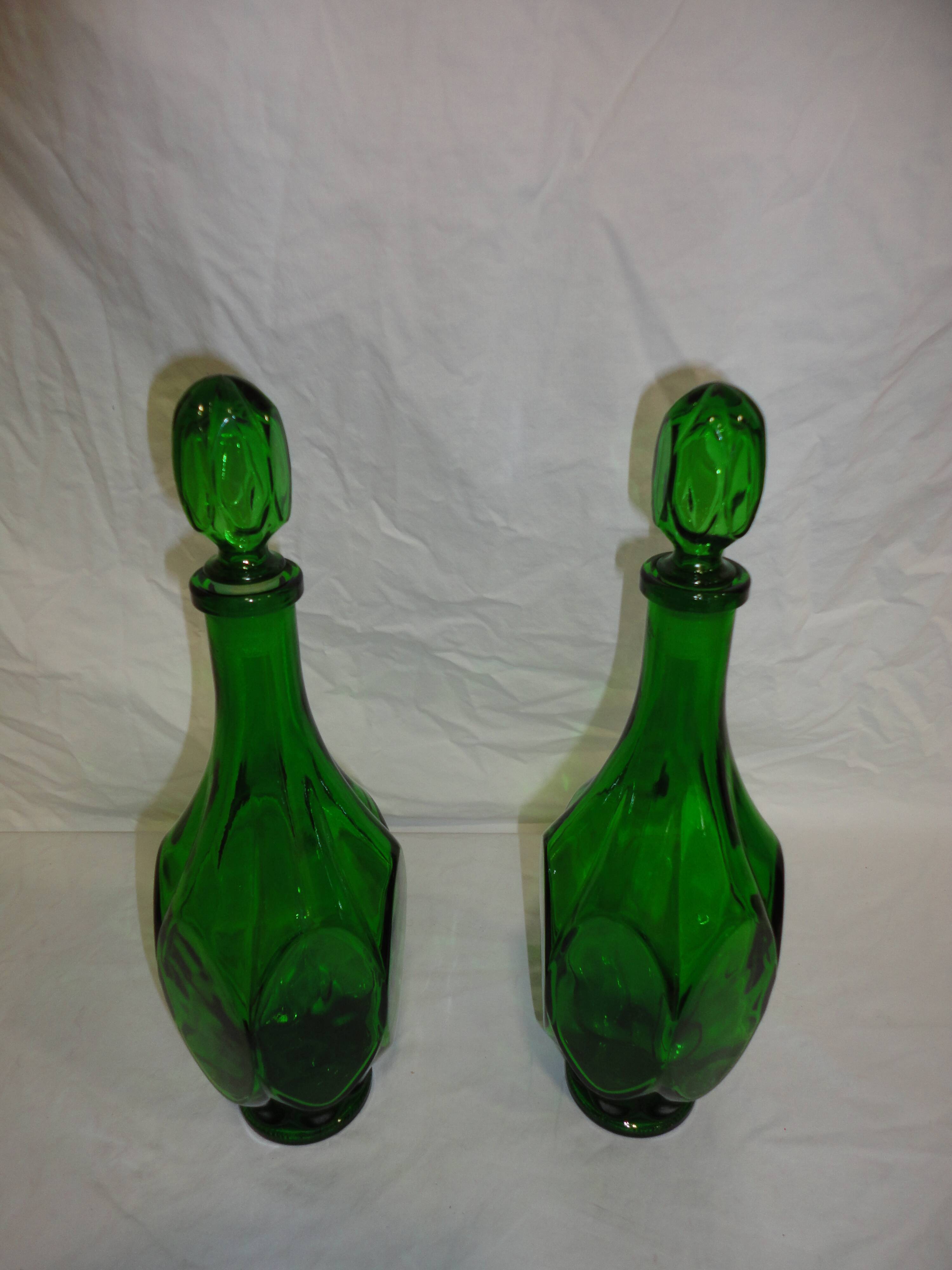 Set of 2 vintage carafes faceted in green glass with caps