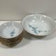 Vintage porcelain service: salad bowl and 8 small bowls.