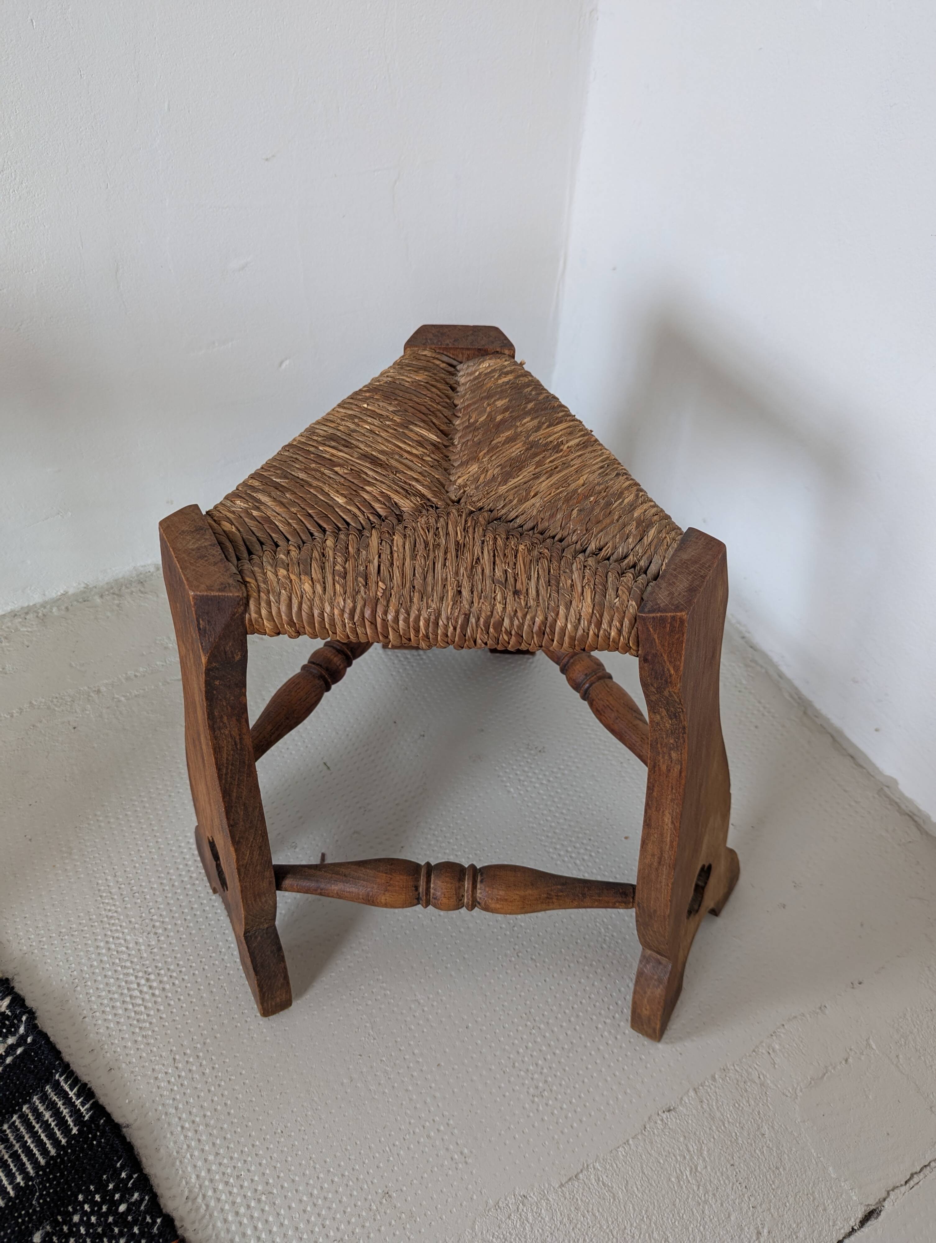 Low tripod farm stool in wood and straw