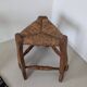 Low tripod farm stool in wood and straw