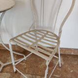 Table and bistro chairs wrought iron terrace