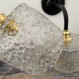 Set of two chiseled glass sconces