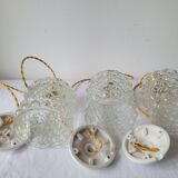 Trio of molded glass pendant lights