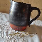 Glazed ceramic pitcher