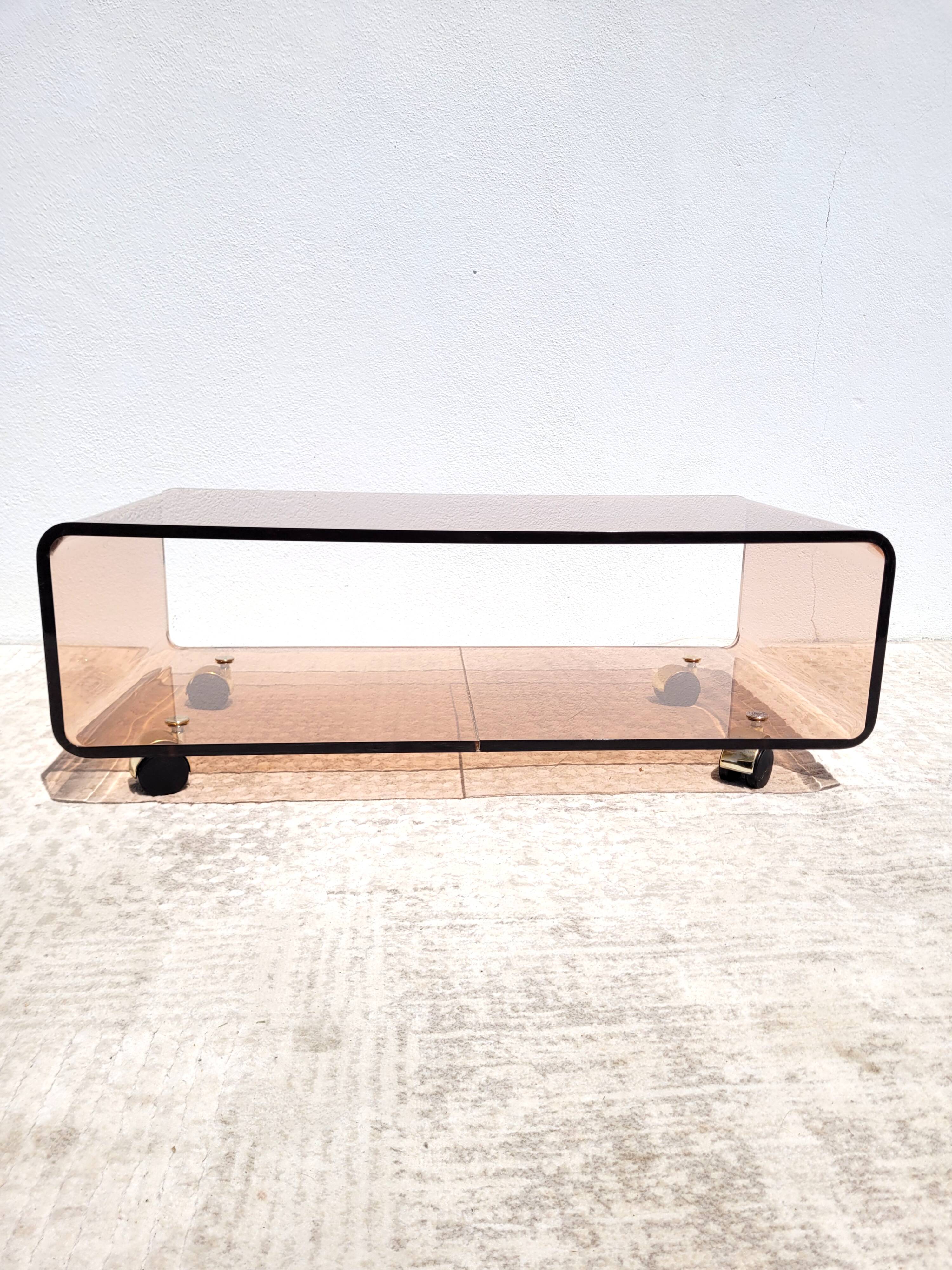 Vintage plexiglass coffee table with wheels 1970