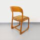 Vintage sled chair by Baumann in wood and wool fabric.