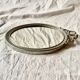 Louis XVI style oval metal wall mirror