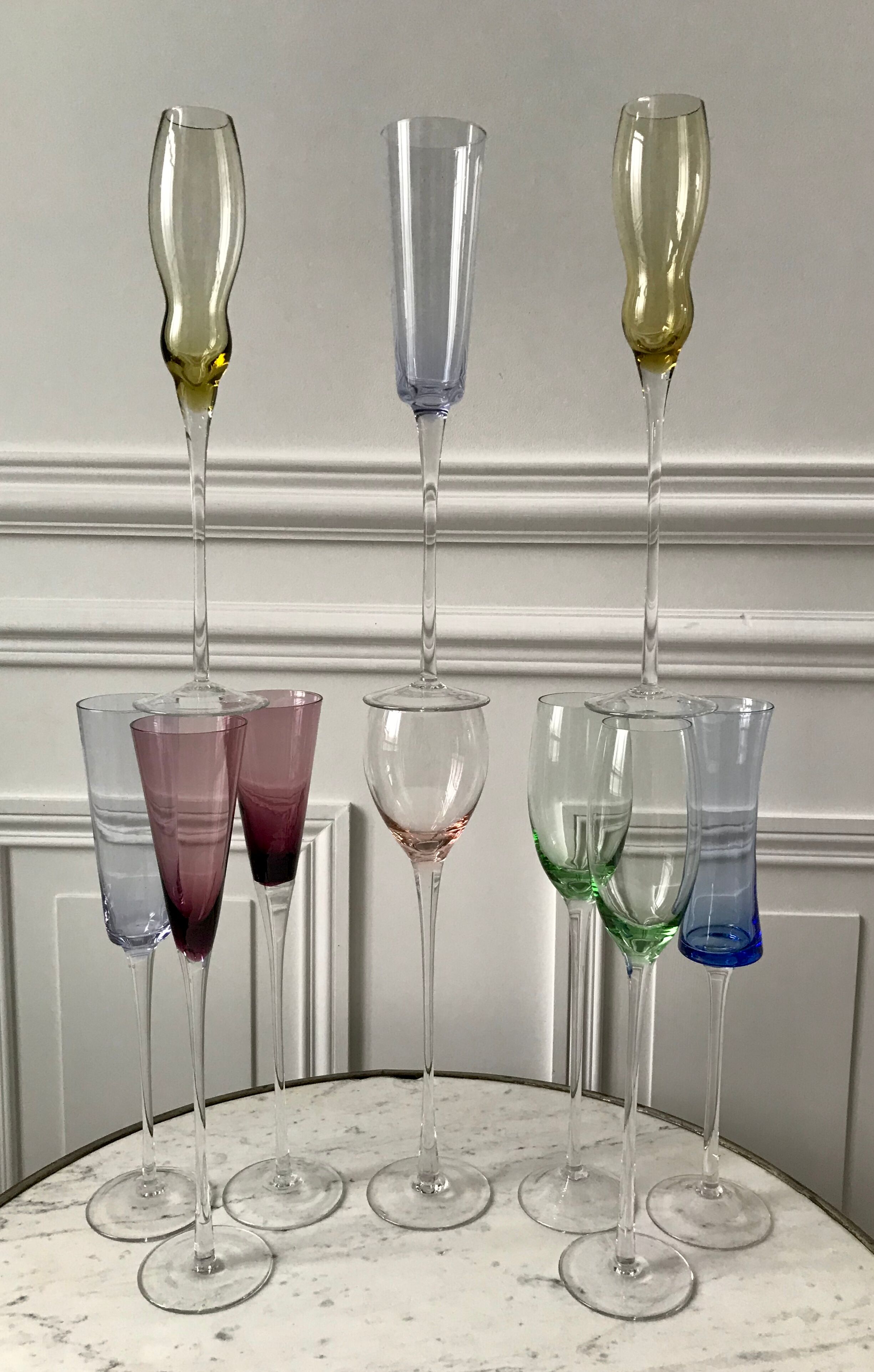 Set of 10 very high champagne flutes in colored glass 70s