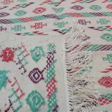White carpet with multicolored Berber patterns handmade
