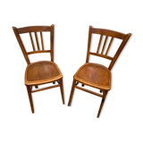 Two vintage curved wooden bistro chairs