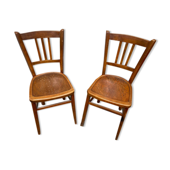 Two vintage curved wooden bistro chairs