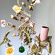 Painted metal chandelier and porcelain flowers