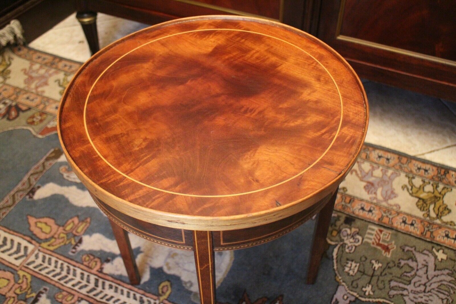 Healed mahogany sofa with Louis XVI-style décor