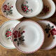 Mismatched plates l'Amandinoise