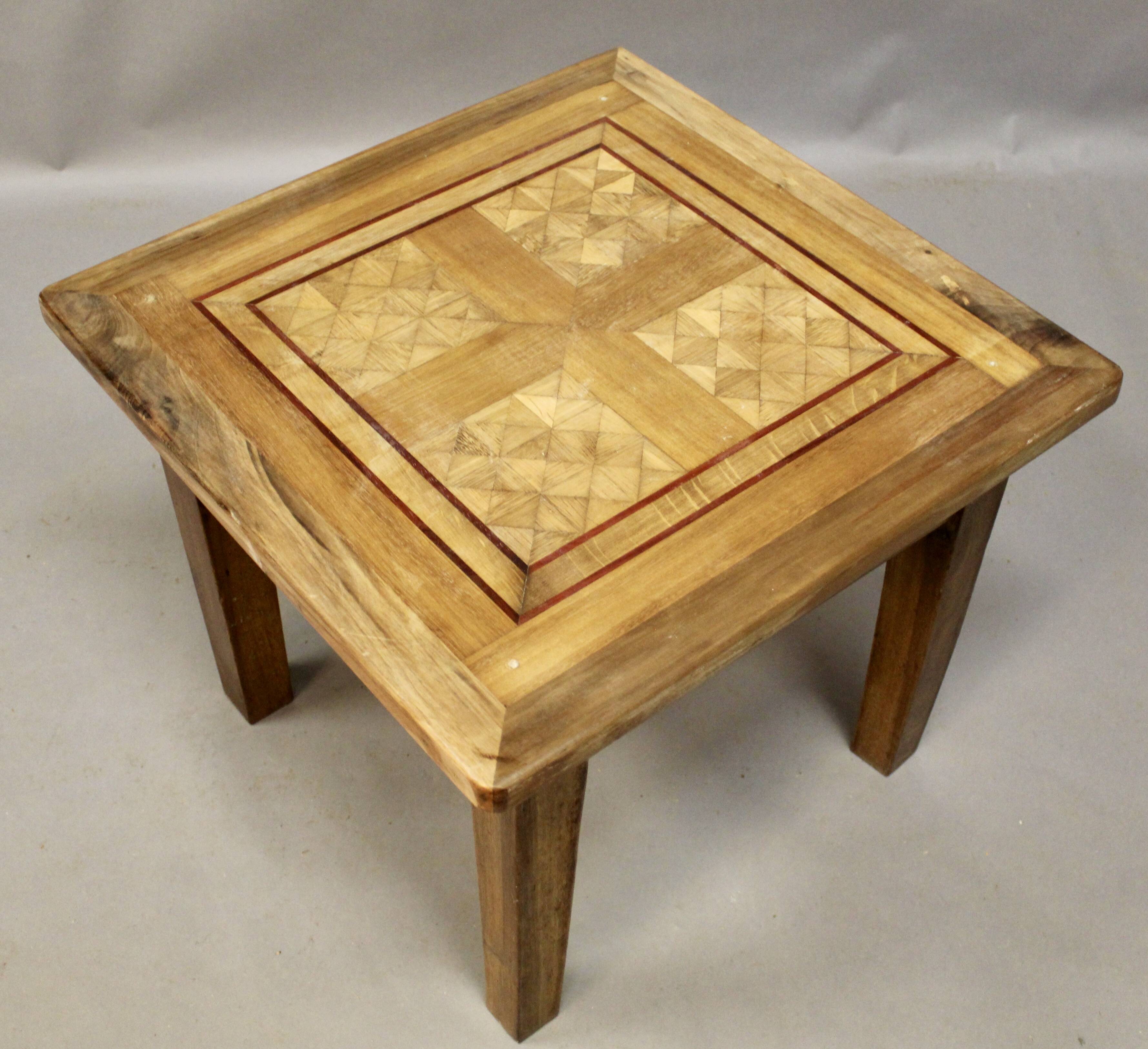 Coffee table on old parquet floor with marquetry