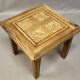 Coffee table on old parquet floor with marquetry