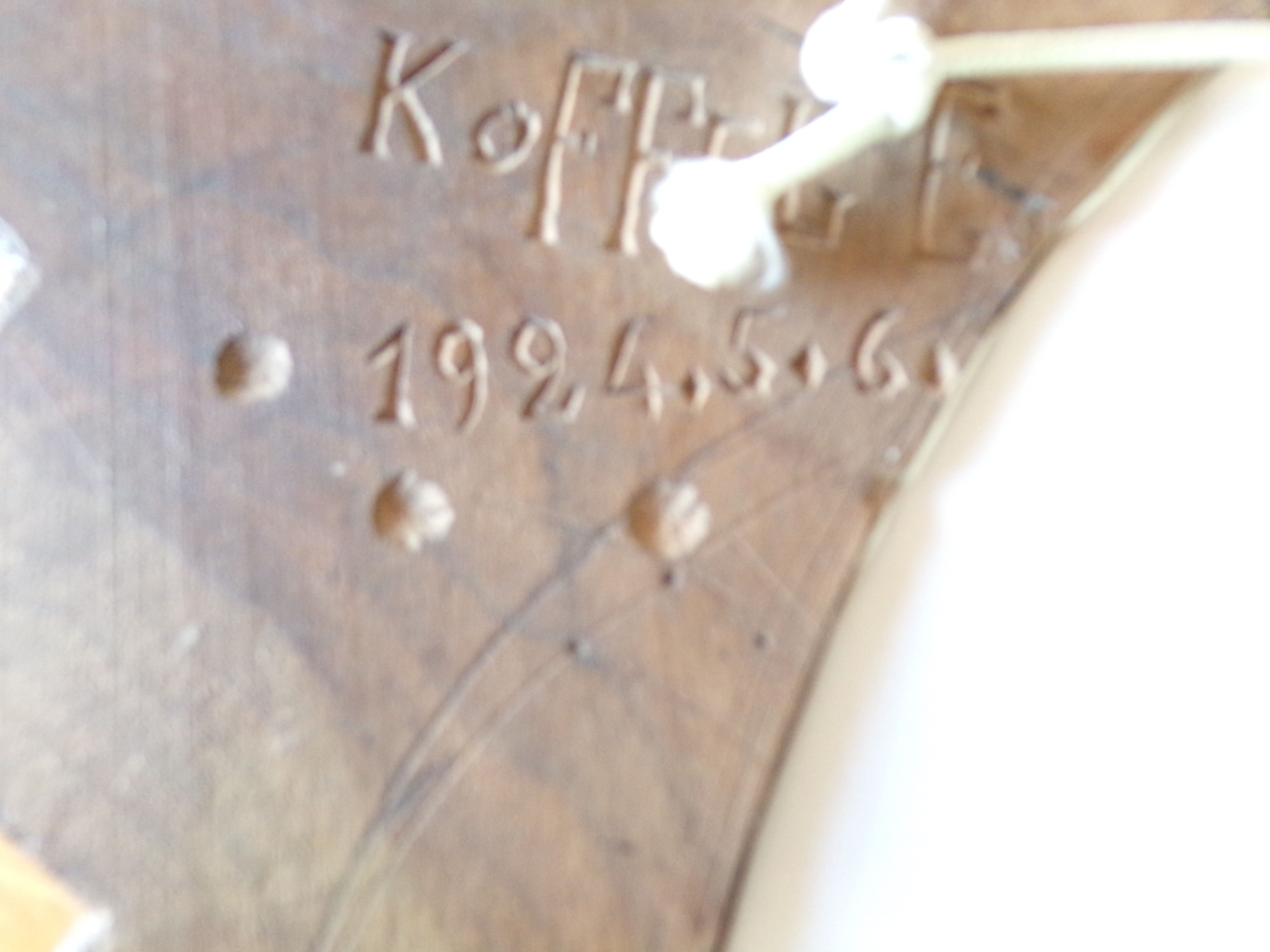 Carved wooden mirror and dated 1924