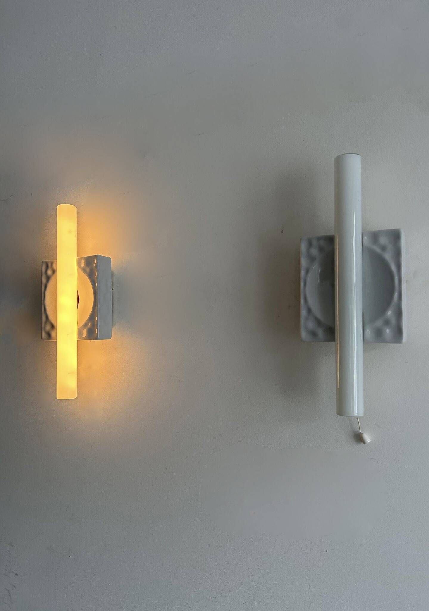 Pair of vintage porcelain wall lights with switch, France 1970.